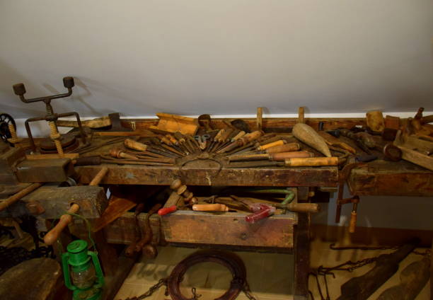 istock A vast arrangement of tools in a workshop including chisels, lamp,sewing machine, rope, hammers, screwdrivers and other old equipment used to carve and process wooden element used by an artisan 1148913313