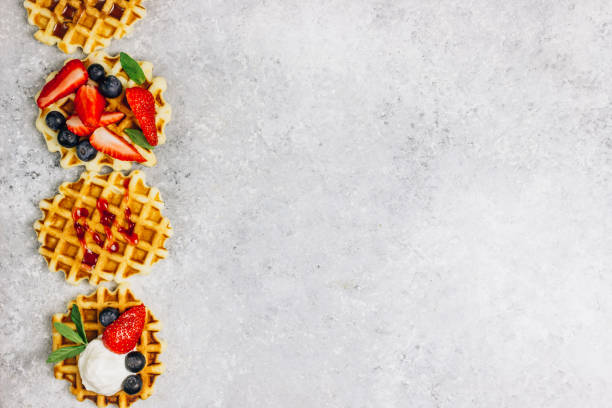 istock Traditional belgian waffles with fresh berries 1148914479