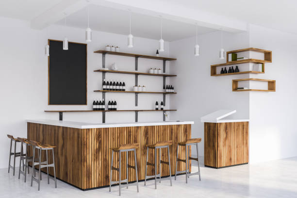istock White restaurant interior with wooden tables, chairs. 3d render 1148914536
