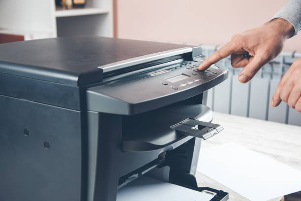 istock worker man with xerox in office 1148914791