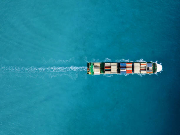 container ship in export and import. international shipping cargo. - ocean freight imagens e fotografias de stock