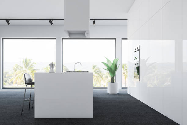 istock Side view of white kitchen with bar 1148915441