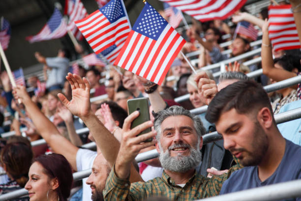 istock Senior american fan taking a selfie at stadium 1148919576