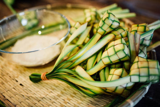 Ketupat in the a plate Ketupat in the a plate prepared for eid celebration in Malaysia traditional malaysian food stock pictures, royalty-free photos & images