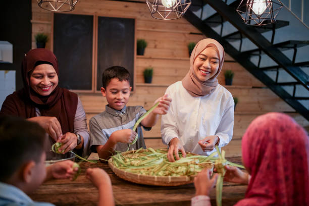 istock Family gathering and preparing food 1148922465