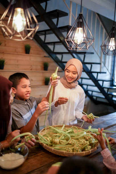 istock Family gathering and preparing food 1148922477