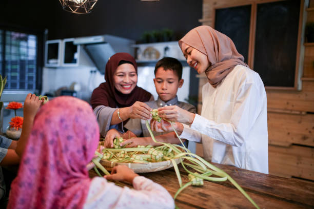 istock Family gathering and preparing food 1148922493