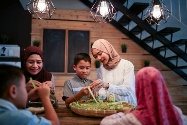istock Family gathering and preparing food 1148923010