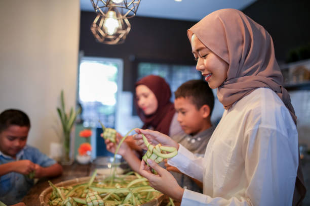 istock Family gathering and preparing food 1148923565