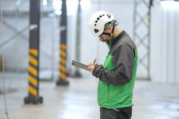 istock Portrait of an engineer working at construction site 1148923651
