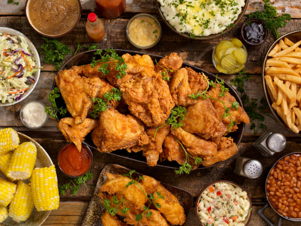 Fried Chicken Feast Fried Chicken Feast fried chicken stock pictures, royalty-free photos & images