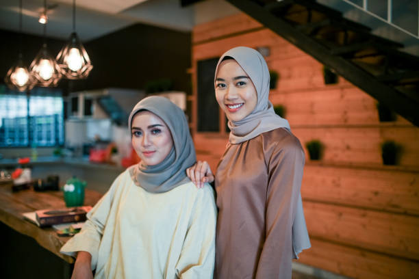 istock Two women smiling and looking at camera 1148937601
