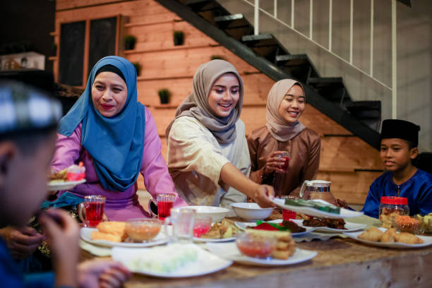 istock Family gathering and eat together 1148937627