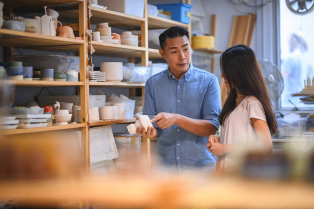 istock Owner selling decor to customer in store 1148939201