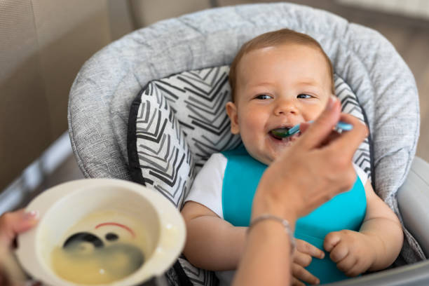 istock One more bite my boy. Open mouth wide 1148939303