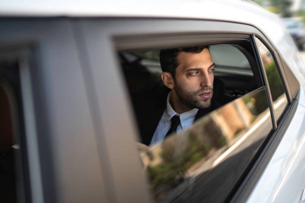 istock Car passenger looking away, contemplating outdoors by the car window 1148940964