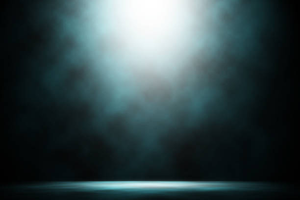 istock Blue spotlight night smoke dark show on stage background. 1148955405