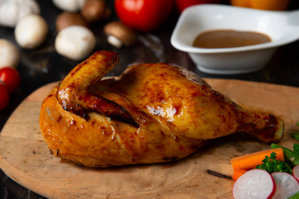 istock roasted chicken on a wooden board 1148967973
