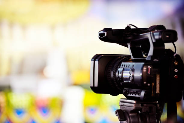 istock Digital video camera of journalist 1148968010