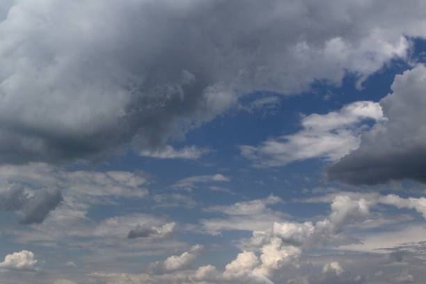 istock nice toned heavy clouds in the sky for using in design as background. 1148970739