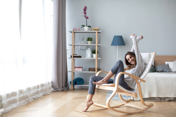 istock Happy young woman relaxing at home. 1148970849
