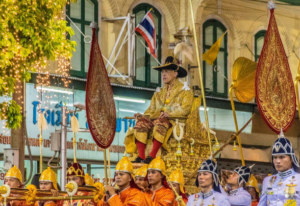 Thailand's King Maha Vajiralongkorn is carried in a golden palanquin during the coronation. Bangkok, Thailand - May 5, 2019: Thailand's King Maha Vajiralongkorn is carried in a golden palanquin during the coronation procession in Bangkok. His Majesty the King of Thailand."King Rama VII" maha vajiralongkorn stock pictures, royalty-free photos & images