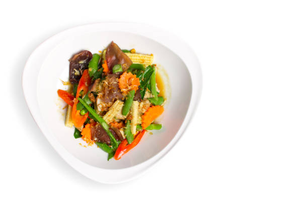 istock Vegetarian food, Stir fried mixed vegetables and mushroom isolate on white background with clipping path 1148974846
