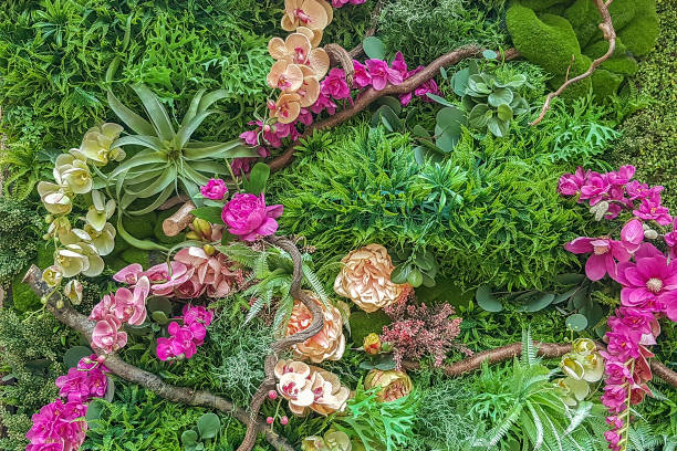istock Decorative fake tropical floral arrangement as background or texture 1148975274
