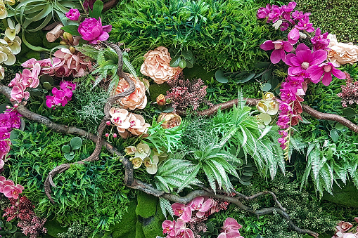 Decorativo falsa arreglos florales tropicales como fondo o textura photo