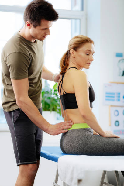 istock Nice dark haired man asking questions to his patient 1148979084