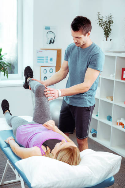 istock Serious young man standing near his patient 1148979117
