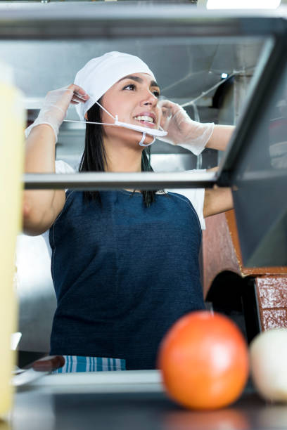 istock Workers cook on the food truck 1148986170
