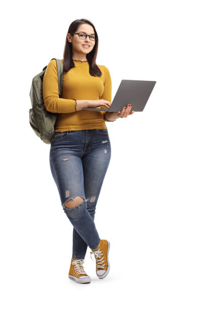 studentinnen stehend und posiert mit einem laptop - schoolgirl teenager teenage girls teenagers only stock-fotos und bilder