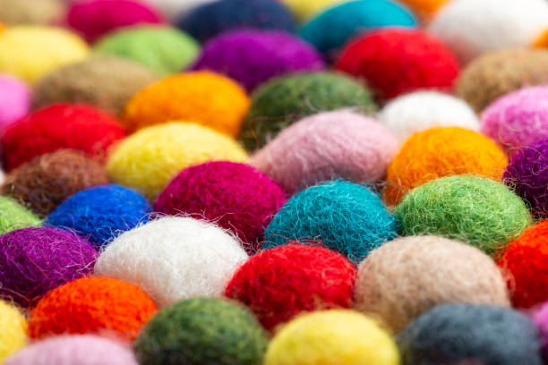 istock Multicolored felt ball rug detail 1148987236