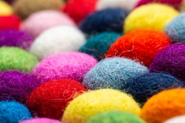 istock Multicolored felt ball rug detail 1148987245