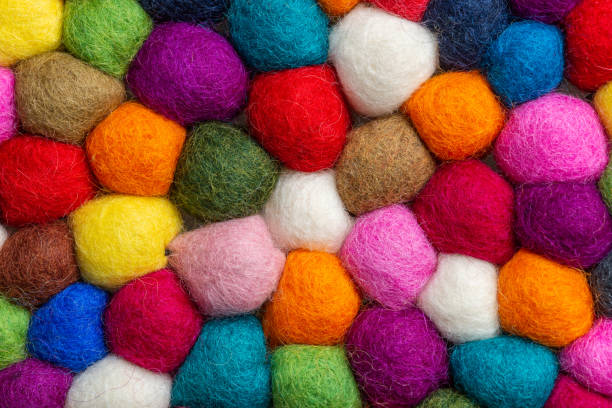 istock Multicolored felt ball rug detail 1148987257