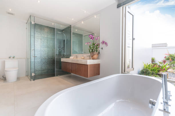 istock Luxury bathroom features basin and bathtub home, house ,building 1148988579