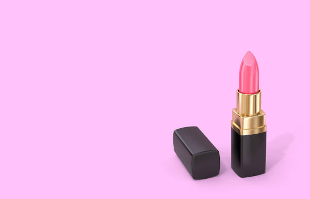 istock Pink lipstick isolated on purple background with copy space 1148989438