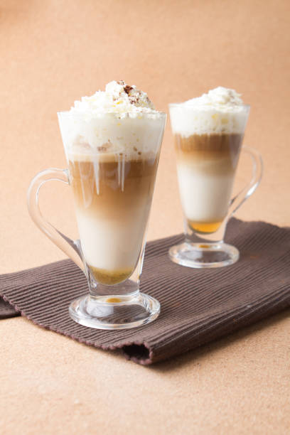 istock coffee caramel macchiato in tall glass with layer 1148994681