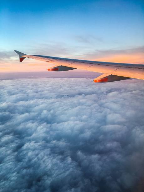 Aile d’un avion au coucher du soleil - Photo