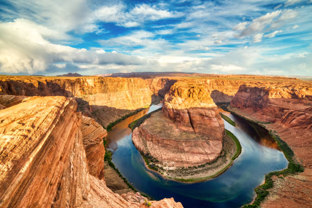 istock Horseshoe Bend on Colorado River at Sunset with Dramatic Cloudy Sky, Utah 1148997775