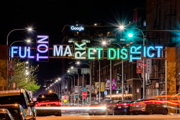 Long exposure light trails at Fulton Market District Gateway. Main street in Chicago. stock photo