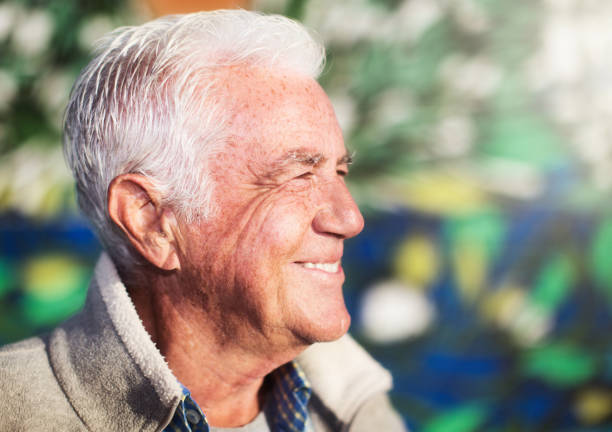 istock Attractive, tanned senior man smiles in bright sunlight 1149003330