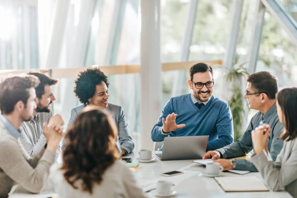 istock Happy business team talking on a meeting at conference table. 1149003617