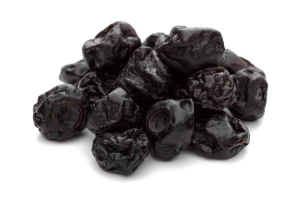 istock Dried blueberries isolated on white 1149005094