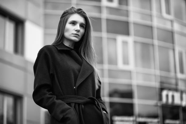 istock Girl in a coat black and white photo 1149007113