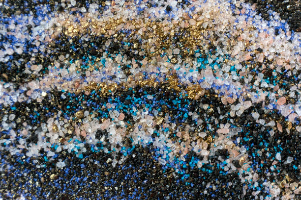 istock Layered colorful sand pattern. Marble style background. Blue and gold powder texture. 1149012081