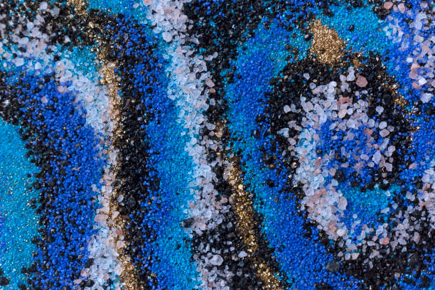 istock Layered colorful sand pattern. Marble style background. Blue and gold powder texture. 1149012097