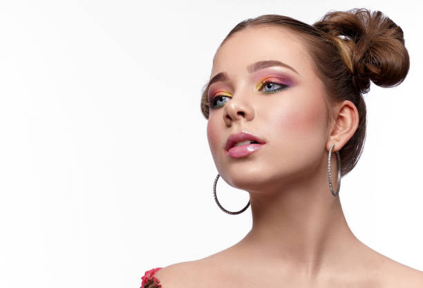 istock Adorable girl enjoying beautiful bright makeup 1149012833