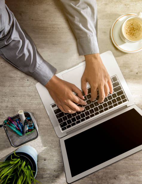istock Top view of businessman working using laptop 1149012950